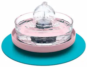 Brook fountain on a pink and teal stand and splash mat