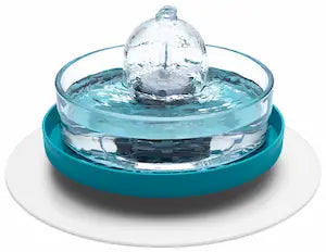 Brook fountain on a teal and white stand and splash mat