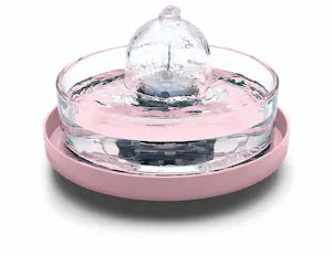 Brook fountain on a pink stand
