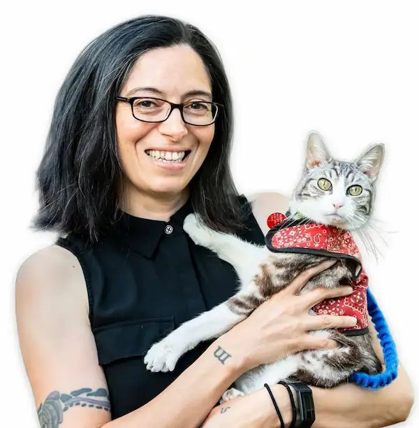 Dr. Mikel Maria Delgado holding her cat