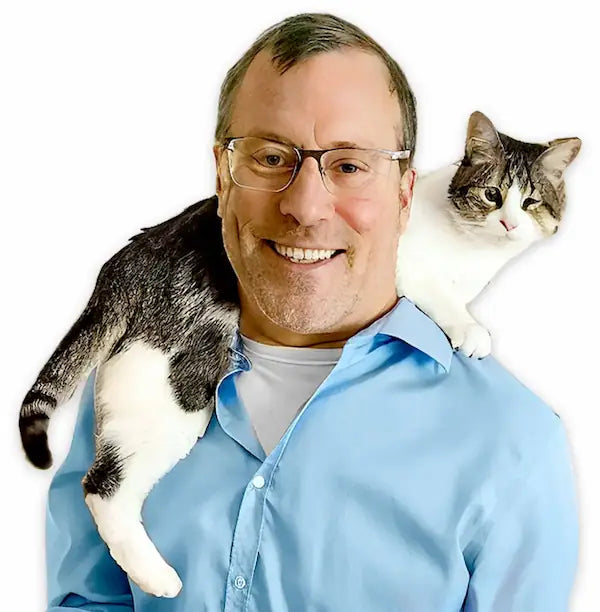 Stephen Quandt with a cat on his shoulder